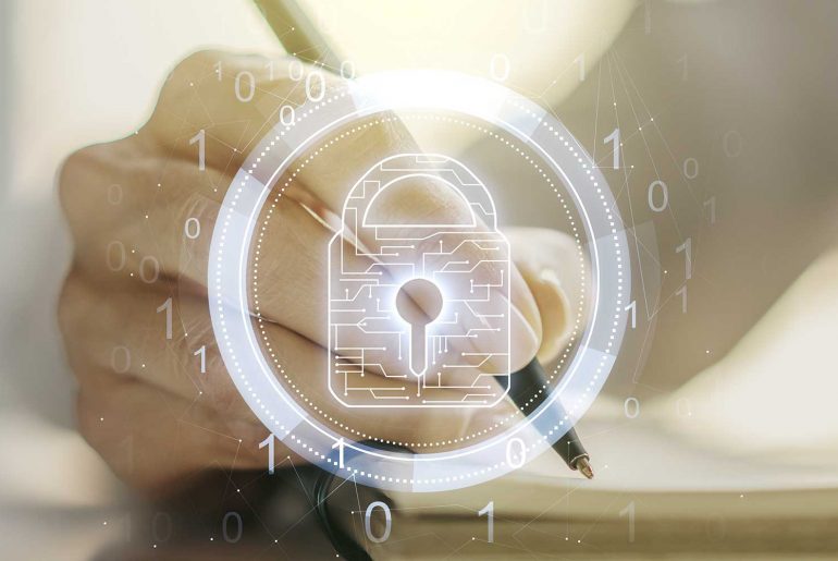 security awareness training feature image of a hand taking notes/writing with a security padlock displayed over it
