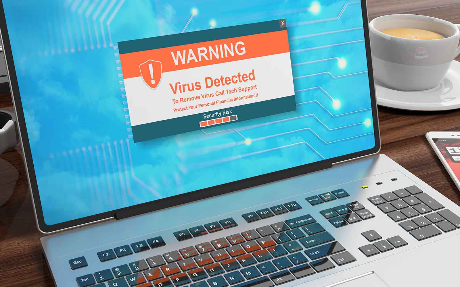 What is a malware attack feature graphic is a picture of a computer displaying a warning message about malware